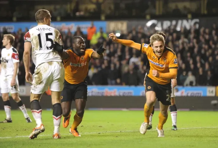 Framed Print : Wolverhampton Wanderers Glory Moment: Kevin Doyle and George Elokobi's Euphoric Celebration After Scoring 2-1 Against Manchester United (Premier League)