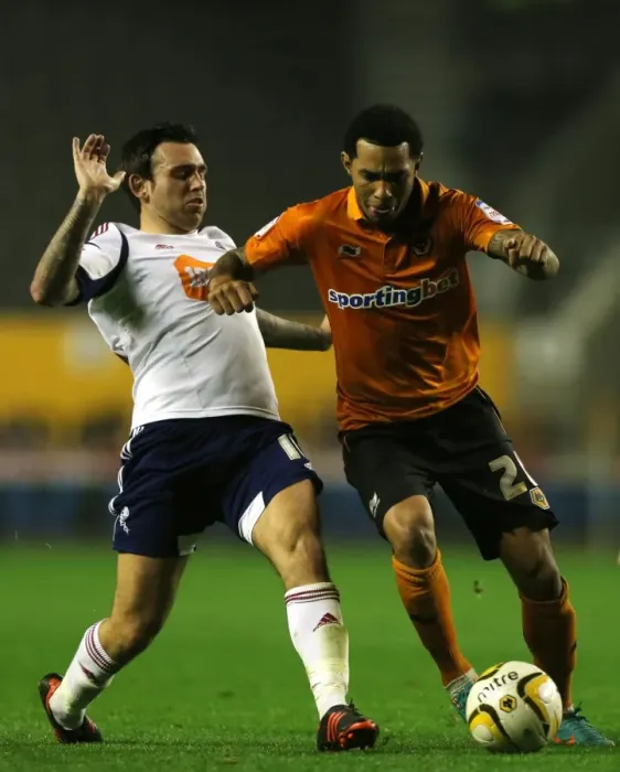 Framed Print : Wolverhampton Wanderers: Jermaine Pennant Outmaneuvers Mark Davies in Championship Showdown at Molineux