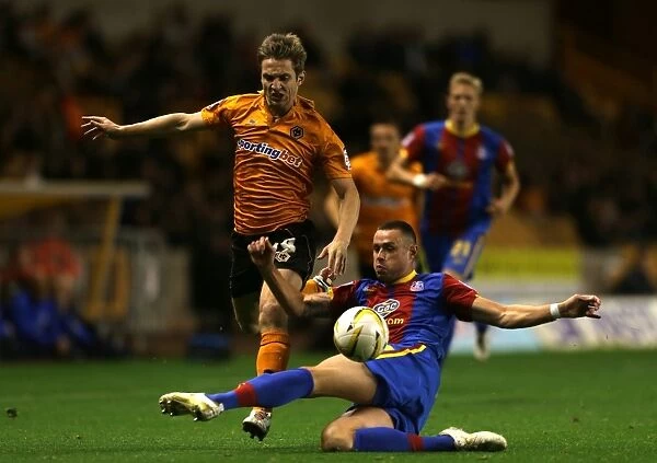 Wolverhampton Wanderers Kevin Doyle Dodges Challenge from Crystal Palace's Damien Delaney in Championship Showdown at Molineux