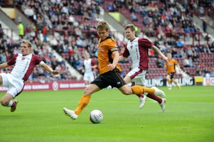 Framed Print : Wolverhampton Wanderers Kevin Doyle: Pursuing Victory - Pre-season Friendly vs Heart of Midlothian: Aiming for the Winning Goal Framed Print : Wolverhampton Wanderers Kevin Doyle: Pursuing Victory - Pre-season Friendly vs Heart of Midlothian: Aiming for the Winning Goal
