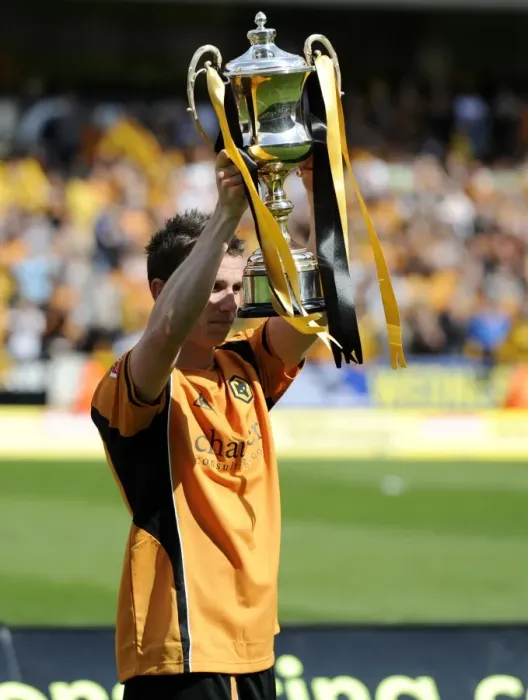 Framed Print : Wolverhampton Wanderers: Kevin Foley's Euphoric Moment with the Championship Trophy (vs Doncaster Rovers, 2008-09)