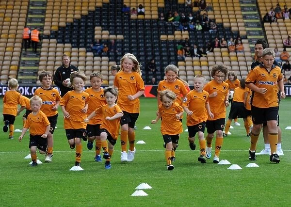 Wolverhampton Wanderers: Matchday Mascots Gear Up for Wolves vs. Real Zaragoza Showdown - Behind the Scenes Training