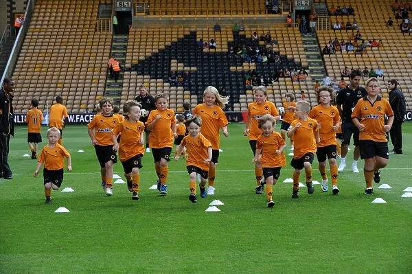 Wolverhampton Wanderers: Matchday Mascots Gearing Up for Battle - Wolves vs. Real Zaragoza