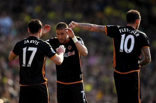 Wolverhampton Wanderers: Matt Jarvis, Michael Kightly, and Steven Fletcher Celebrate Goal Against Norwich City in Barclays Premier League