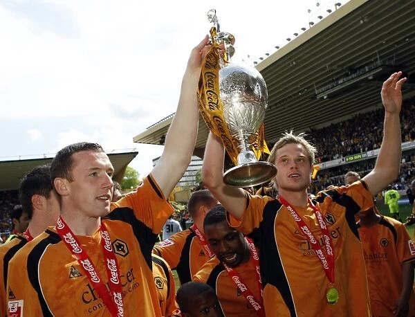 Wolverhampton Wanderers: Neill Collins and Richard Stearman Celebrate Championship Promotion with the Trophy
