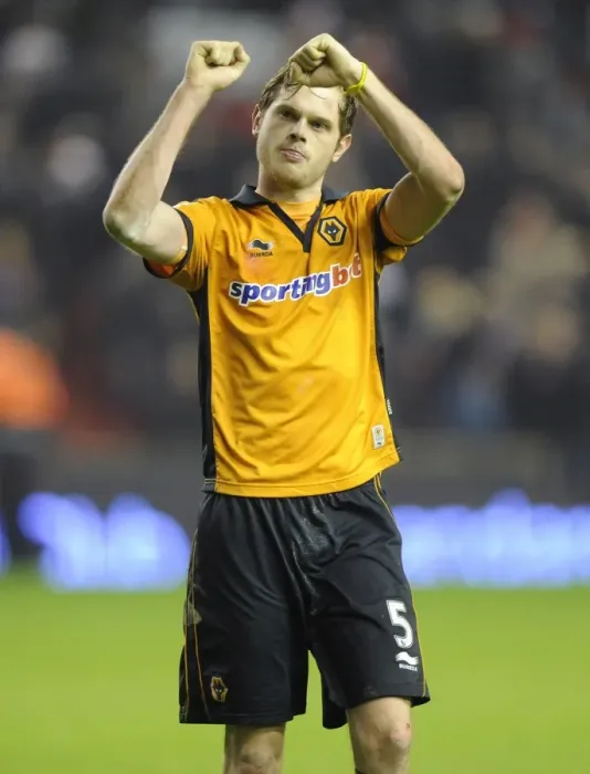 Framed Print : Wolverhampton Wanderers Richard Stearman: Celebrating a Historic Victory Against Liverpool in the Barclays Premier League