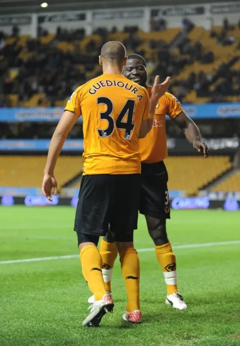 Framed Print : Wolverhampton Wanderers Triumph: Elokobi and Guedioura's Goals Secure 3-0 Carling Cup Victory over Millwall