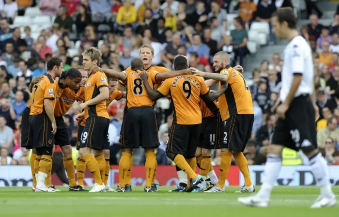 Framed Print : Wolverhampton Wanderers: United in Focus - Pre-Match Huddle (Fulham vs. Wolves, Premier League)