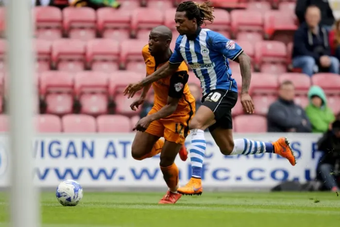 Framed Print : Wolverhampton Wanderers vs. Wigan Athletic: Intense Clash Between Benik Afobe and Gaetan Bong in Sky Bet Championship Framed Print : Wolverhampton Wanderers vs. Wigan Athletic: Intense Clash Between Benik Afobe and Gaetan Bong in Sky Bet Championship