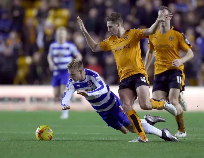 Framed Print : Wolverhampton Wanderers vs. Reading: Clash at Molineux - Edwards Fouls Vydra in Sky Bet Championship Match Framed Print : Wolverhampton Wanderers vs. Reading: Clash at Molineux - Edwards Fouls Vydra in Sky Bet Championship Match