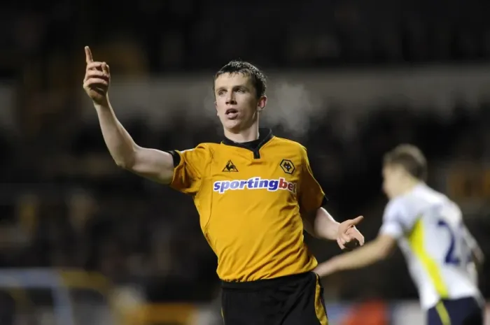 Framed Print : Wolverhampton Wanderers vs. Tottenham Hotspur: Kevin Foley's Intense Action in Barclays Premier League Soccer