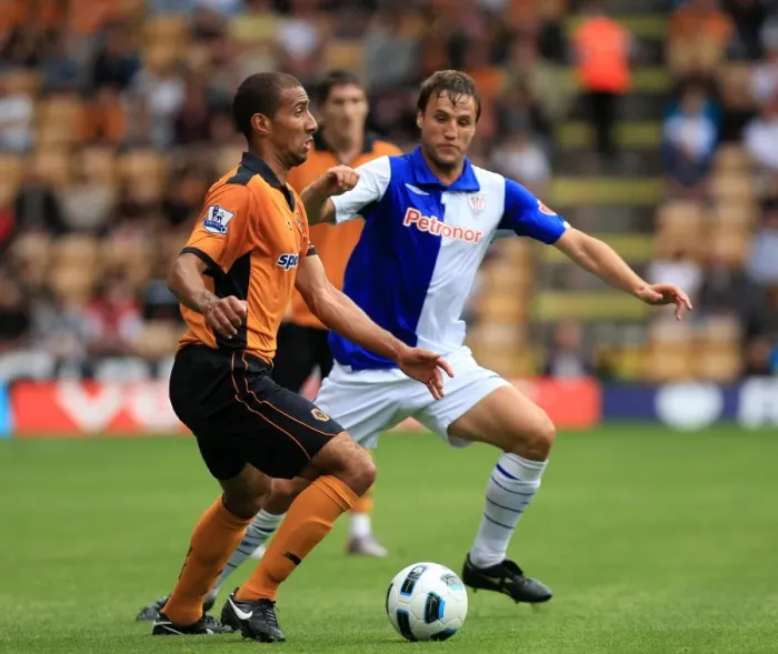 Framed Print : Wolverhampton Wanderers vs Athletic Bilbao: A Tense Moment Between Karl Henry and Carlos Gurpegui Framed Print : Wolverhampton Wanderers vs Athletic Bilbao: A Tense Moment Between Karl Henry and Carlos Gurpegui