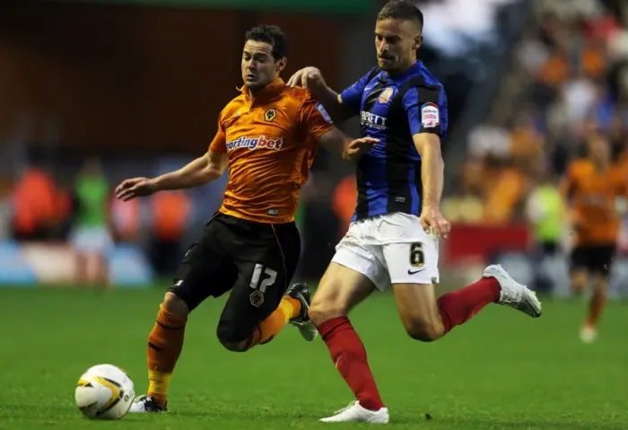 Framed Print : Wolverhampton Wanderers vs Barnsley: A Championship Showdown - The Intense Rivalry Between Jarvis and Foster Framed Print : Wolverhampton Wanderers vs Barnsley: A Championship Showdown - The Intense Rivalry Between Jarvis and Foster