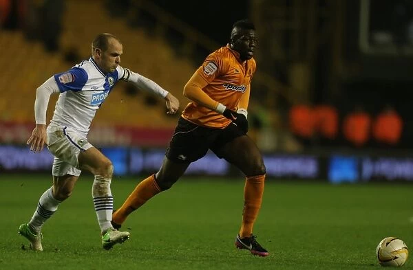 Wolverhampton Wanderers vs. Blackburn Rovers: Bakary Sako Evades Danny Murphy's Tackle in Championship Showdown at Molineux