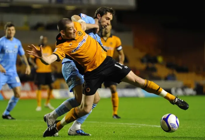 Framed Print : Wolverhampton Wanderers vs Doncaster Rovers: FA Cup Clash - David Jones vs Mark Wilson: A Battle at the Heart of the Field Framed Print : Wolverhampton Wanderers vs Doncaster Rovers: FA Cup Clash - David Jones vs Mark Wilson: A Battle at the Heart of the Field
