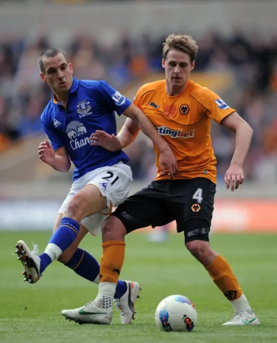 Framed Print : Wolverhampton Wanderers vs. Everton: A Premier League Battle - Edwards vs. Osman
