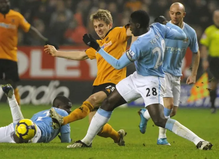 Framed Print : Wolverhampton Wanderers vs Manchester City: A Premier League Battle - Doyle vs Toure Framed Print : Wolverhampton Wanderers vs Manchester City: A Premier League Battle - Doyle vs Toure