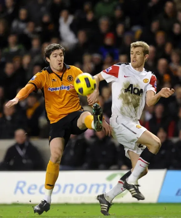 Framed Print : Wolverhampton Wanderers vs Manchester United: A Football Rivalry - A Head-to-Head Battle between Stephen Ward and Darren Fletcher