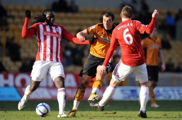 Framed Print : Wolverhampton Wanderers vs Stoke City: Nenad Milijas Stands Firm Against Kenwyne Jones and Glenn Whelan in FA Cup Round Four Framed Print : Wolverhampton Wanderers vs Stoke City: Nenad Milijas Stands Firm Against Kenwyne Jones and Glenn Whelan in FA Cup Round Four
