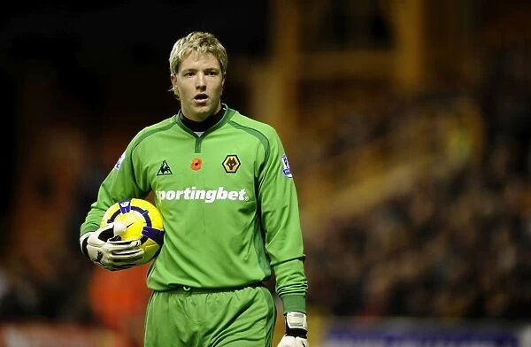 Wolverhampton Wanderers' Wayne Hennessey Pays Tribute with Poppy in Premier League Match Against Arsenal
