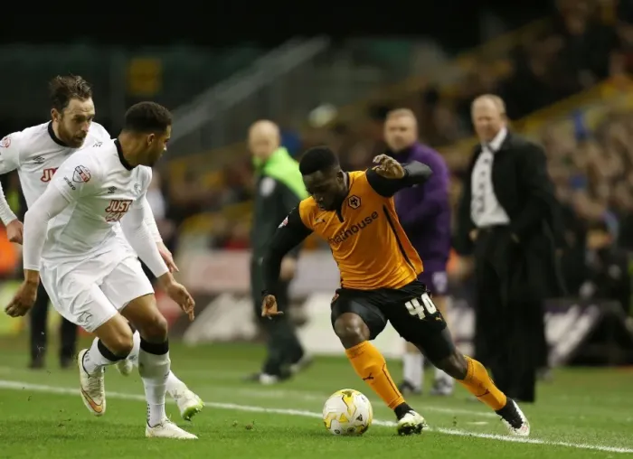 Framed Print : Wolves vs Derby County: Intense Battle Between Nouha Dicko and Cyrus Christie at Molineux Stadium (Sky Bet Championship) Framed Print : Wolves vs Derby County: Intense Battle Between Nouha Dicko and Cyrus Christie at Molineux Stadium (Sky Bet Championship)