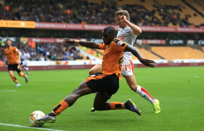 Framed Print : Wolves vs Huddersfield: Intense Battle for Ball Possession - Sheyi Ojo vs Martin Cranie (Sky Bet Championship) Framed Print : Wolves vs Huddersfield: Intense Battle for Ball Possession - Sheyi Ojo vs Martin Cranie (Sky Bet Championship)