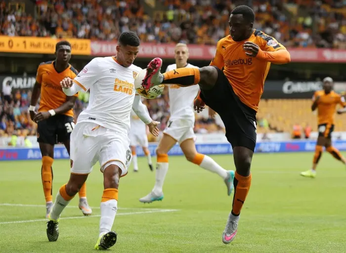 Framed Print : Wolves vs Hull City Showdown: A Championship Clash between Nouha Dicko and Curtis Davis Framed Print : Wolves vs Hull City Showdown: A Championship Clash between Nouha Dicko and Curtis Davis