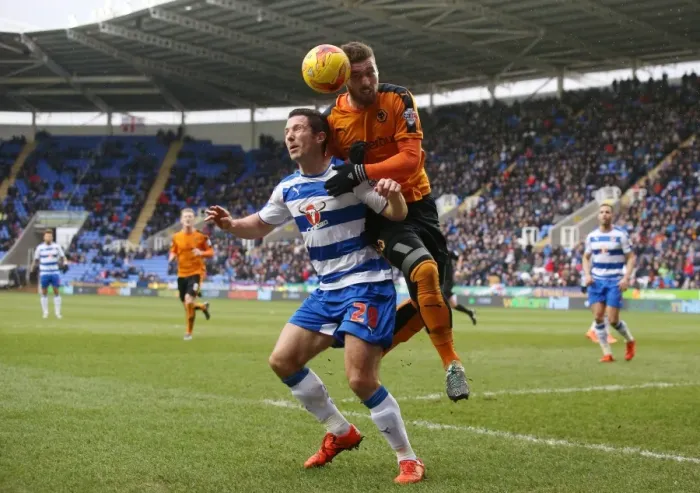 Framed Print : Wolves vs. Reading: Intense Aerial Battle Between Yann Kermorgant and Matt Doherty in Sky Bet Championship