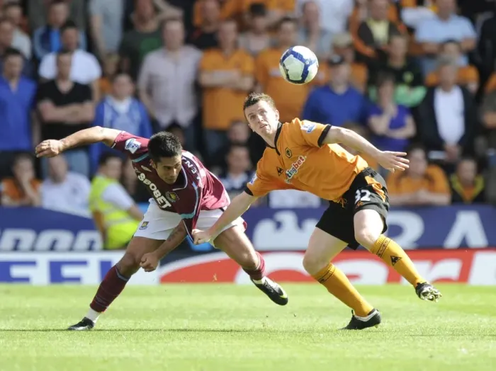 Framed Print : Wolves vs West Ham: Luis Jimenez vs Kevin Foley - Intense Clash at Molineux, Premier League 2009-09 Framed Print : Wolves vs West Ham: Luis Jimenez vs Kevin Foley - Intense Clash at Molineux, Premier League 2009-09