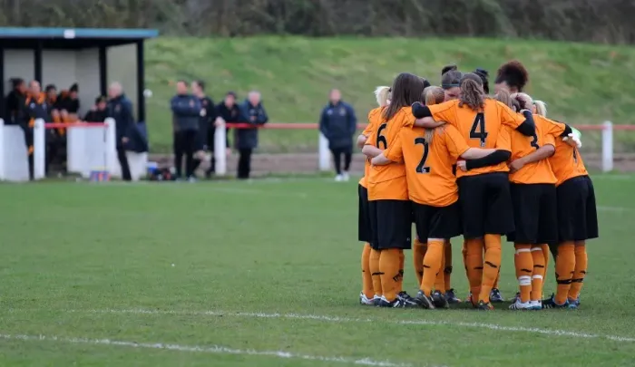 Framed Print : Wolves Women Unite: A Powerful Huddle Before Kick-Off Against Leafield Athletic Framed Print : Wolves Women Unite: A Powerful Huddle Before Kick-Off Against Leafield Athletic
