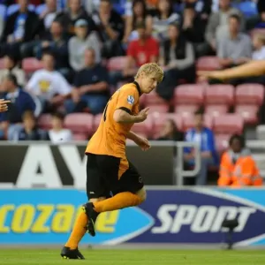 Andrew Keogh Scores the Opener: Wolverhampton Wanderers Triumph at Wigan Athletic (BPL, August 18, 2009)