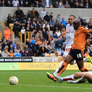Benik Afobe Scores His Second Goal: Wolves Victory Over Huddersfield Town in Sky Bet Championship