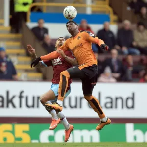 Burnley vs. Wolves: Gray and Hause Engage in Intense Battle for Ball Control in Sky Bet Championship Match at Turf Moor