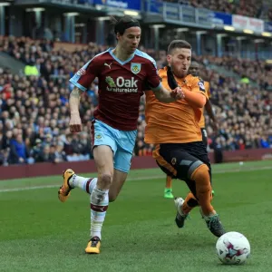 Burnley vs. Wolves: Intense Battle for the Ball between George Boyd and Matt Doherty at Turf Moor