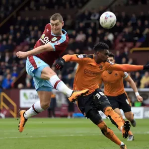 Burnley's Sam Vokes Tries to Score Past Wolves Kortney Hause in Sky Bet Championship Match