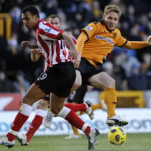 Clash between Kevin Doyle and Anton Ferdinand: A Intense Moment in the Wolverhampton Wanderers vs Sunderland Barclays Premier League Match