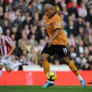 Clash in the Premier League: Chris Iwelumo's Determined Performance - Stoke City vs. Wolverhampton Wanderers Clash in the Premier League: Chris Iwelumo's Determined Performance - Stoke City vs. Wolverhampton Wanderers