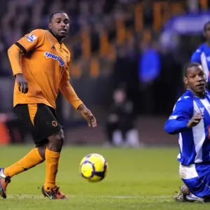 A Clash of Titans: Ebanks-Blake vs Bramble - Wolves vs Wigan Football Rivalry