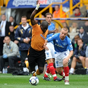 Clash of the Titans: Elokobi vs. O'Hara in Wolverhampton Wanderers vs. Portsmouth Barclays Premier League Showdown