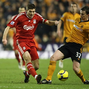 A Clash of Titans: Gerrard vs Foley - Wolverhampton Wanderers vs Liverpool, Barclays Premier League Soccer