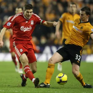 A Clash of Titans: Gerrard vs Foley - Wolverhampton Wanderers vs Liverpool, Barclays Premier League Soccer