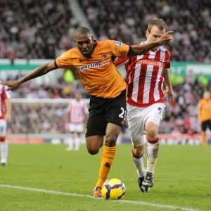 Clash of Titans: Zubar vs. Whelan in the Intense Battle between Stoke and Wolves Clash of Titans: Zubar vs. Whelan in the Intense Battle between Stoke and Wolves