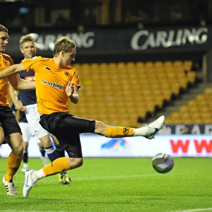 David Edwards Scores the Opener: Wolverhampton Wanderers Lead Millwall in Carling Cup Third Round