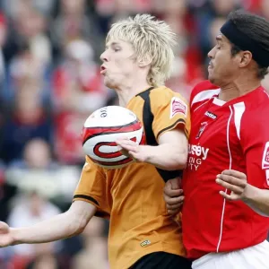 Denis Souza vs. Andrew Keogh: Championship Clash between Barnsley and Wolverhampton Wanderers, 2009 Denis Souza vs. Andrew Keogh: Championship Clash between Barnsley and Wolverhampton Wanderers, 2009