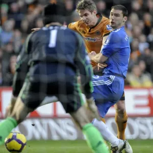 Determined Clash: Kevin Doyle vs Branislav Ivanovic - Wolverhampton Wanderers vs Chelsea Determined Clash: Kevin Doyle vs Branislav Ivanovic - Wolverhampton Wanderers vs Chelsea