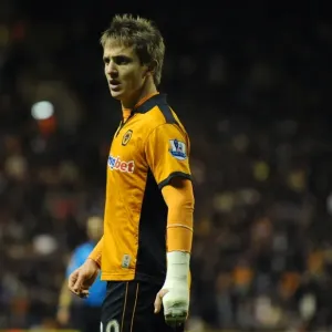 Determined Strike: Kevin Doyle Scores for Wolverhampton Wanderers Against Arsenal in the Barclays Premier League