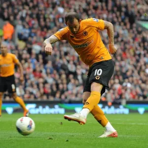 Determined Strike: Steven Fletcher Goes for Glory Against Liverpool in Premier League Soccer