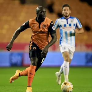Determined Yannick Sagbo's Brilliant Performance: Wolves vs Huddersfield Town in Sky Bet Championship Determined Yannick Sagbo's Brilliant Performance: Wolves vs Huddersfield Town in Sky Bet Championship