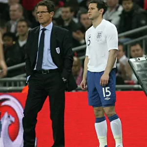 Fabio Capello Ponders Substitution: Matthew Jarvis of Wolverhampton Wanderers Ready to Enter the Field for England