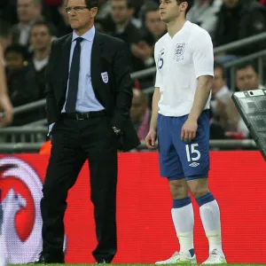 Fabio Capello Ponders Substitution: Matthew Jarvis of Wolverhampton Wanderers Ready to Enter the Field for England